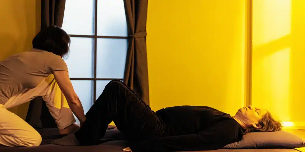 Assisted stretch providing relief for very tight lower back muscles.