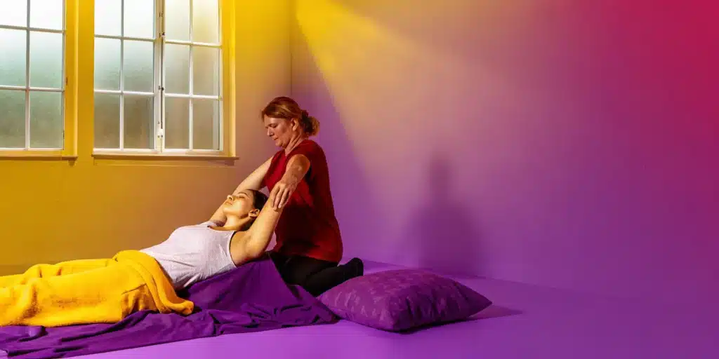 Assisted stretch for sore muscles to help with workout recovery.