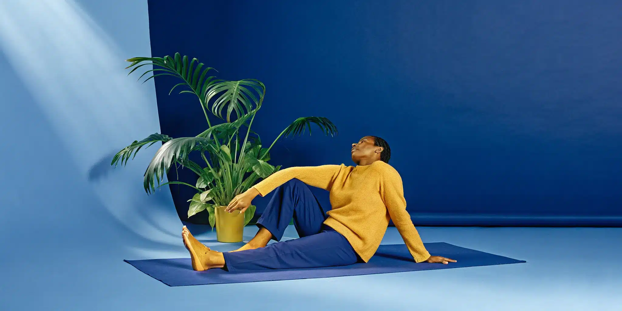 Seated leg stretch exercise to loosen tight leg muscles.