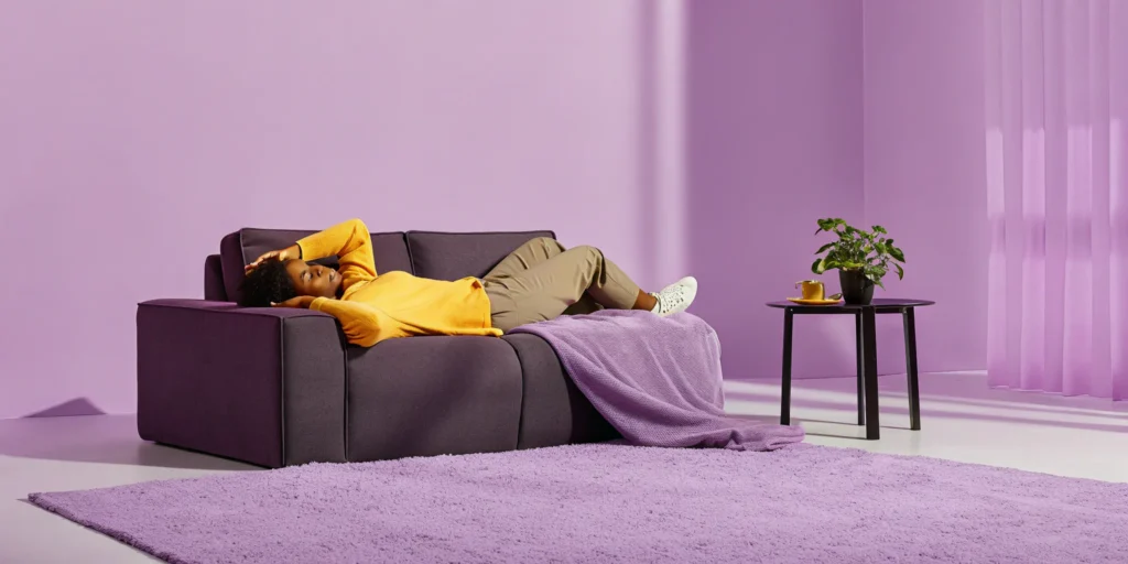 How to relieve severe lower back pain by relaxing in a supported position on a sofa.